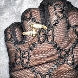 Adjustable Yellow Gold plated nail ring with cubic zirconia diamonds.